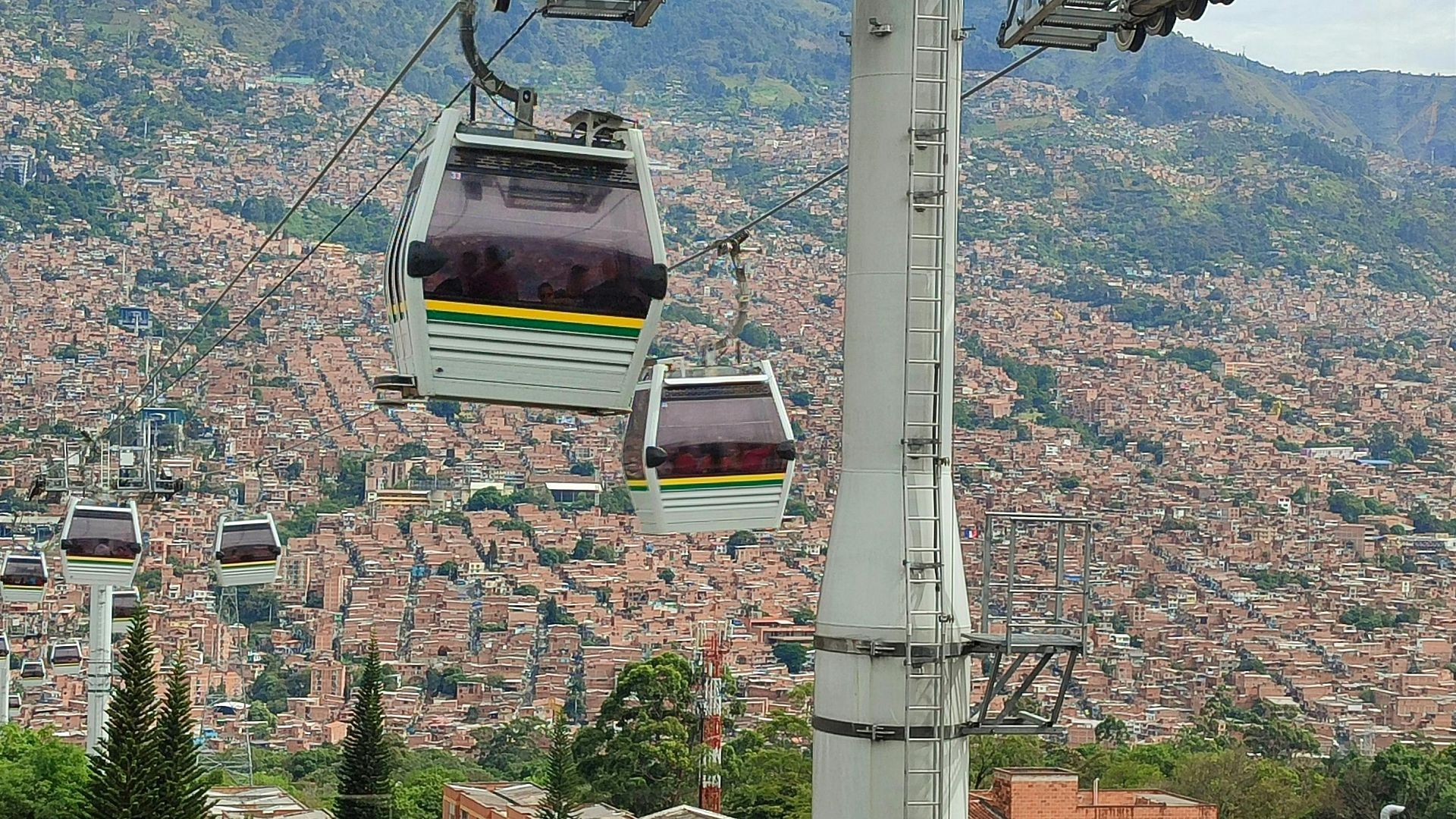 What is the Metrocable and why is it a must-see in Medellín?